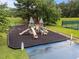 Community playground with climbing structures, slide, and soft landing surface at 2913 Coxindale Dr, Raleigh, NC 27615