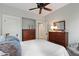 Cozy bedroom featuring wooden furniture and a plush white comforter at 308 W Whitaker Mill Rd, Raleigh, NC 27608