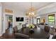 Open-concept dining area with stylish chandelier, connecting seamlessly to the living spaces at 308 W Whitaker Mill Rd, Raleigh, NC 27608