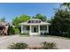 Beautiful single-story home with a charming front porch, green shutters, and landscaped front yard at 308 W Whitaker Mill Rd, Raleigh, NC 27608