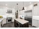 Well-appointed kitchen featuring stainless steel appliances and plenty of counter space at 308 W Whitaker Mill Rd, Raleigh, NC 27608