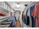 Spacious walk-in closet with custom shelving and storage for organization at 308 W Whitaker Mill Rd, Raleigh, NC 27608