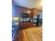 This kitchen boasts wooden cabinets, hardwood floors, and stainless steel appliances at 3298 Oakridge Dr # A, Graham, NC 27253