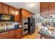 This kitchen has a built-in microwave and double oven with stainless steel appliances at 3298 Oakridge Dr # A, Graham, NC 27253