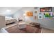 Bright bedroom with a skylight, sitting area, and decorative rug at 352 Weymouth Close, Pittsboro, NC 27312