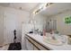 Bright bathroom with double sinks and a shower at 3712 Old Coach Rd, Raleigh, NC 27616