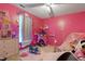 Pink bedroom with playful decor, including a tent and princess-themed decorations at 3712 Old Coach Rd, Raleigh, NC 27616