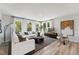 Cozy living room features stylish furniture and plenty of natural light at 404 Gaston Park Ln # 200, Wake Forest, NC 27587