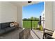 Relaxing outdoor patio with comfortable seating and a beautiful view of the green space at 404 Gaston Park Ln # 200, Wake Forest, NC 27587