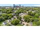 Aerial view showcasing the neighborhood's lush greenery and city skyline at 413 Top Greene Ln, Raleigh, NC 27601