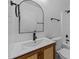 Beautiful bathroom with updated fixtures, mirror, and sink at 413 Top Greene Ln, Raleigh, NC 27601