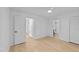 Spacious bedroom with hardwood floors, ceiling fan, and closet at 413 Top Greene Ln, Raleigh, NC 27601