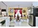 Open concept kitchen/dining area, with stainless steel appliances and tile flooring at 414 Ash Lily Ct, Nashville, NC 27856