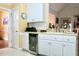 Stylish wet bar area featuring a wine refrigerator, sink, and modern cabinetry at 414 Ash Lily Ct, Nashville, NC 27856