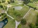 Aerial view of the land, pond, and circular driveway at 4659 Antioch Rd, Oxford, NC 27565