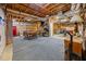 Unfinished basement area with exposed wood framing, offering ample storage and potential living space at 4659 Antioch Rd, Oxford, NC 27565