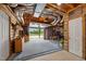 Spacious garage with high ceilings, exposed duct work and access to the outdoors at 4659 Antioch Rd, Oxford, NC 27565