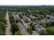 Aerial view of a townhome community, showcasing a well-planned neighborhood surrounded by green trees at 4933 Wyatt Brook Way, Raleigh, NC 27609