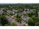 A well-maintained townhome community surrounded by lush trees, showing neat rows of residences at 4933 Wyatt Brook Way, Raleigh, NC 27609