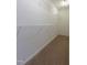 Walk-in closet boasts lots of shelving for storage and plush carpet at 4933 Wyatt Brook Way, Raleigh, NC 27609