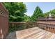 Outdoor wooden deck featuring a view of lush greenery, great for relaxation and entertainment at 4933 Wyatt Brook Way, Raleigh, NC 27609