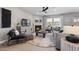 Cozy living room with a fireplace, comfortable seating, and stylish decor at 512 Providence Springs Ln, Fuquay Varina, NC 27526