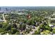 A lush, green neighborhood view showcasing the home with mature greenery at 516 Ottawa Ave, Durham, NC 27701