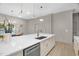 Bright kitchen features an island with white marble countertop and modern stainless steel appliances at 516 Ottawa Ave, Durham, NC 27701