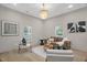 Bright living room showcasing neutral decor, modern art, and hardwood floors, perfect for relaxation and entertaining at 516 Ottawa Ave, Durham, NC 27701