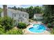 Backyard aerial showcasing the in-ground pool, lounge area, and manicured landscaping at 5301 Night Heron Dr, Wake Forest, NC 27587