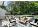 Outdoor deck with seating, perfect for enjoying the pool view and surrounding nature at 5301 Night Heron Dr, Wake Forest, NC 27587
