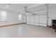 Spacious two car garage featuring an automatic door and brick base trim at 5301 Night Heron Dr, Wake Forest, NC 27587