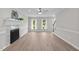 Light, bright living room with fireplace, ceiling fan, and stairs at 5301 Night Heron Dr, Wake Forest, NC 27587