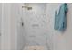 Modern tiled shower with bronze fixtures and recessed niche at 5301 Night Heron Dr, Wake Forest, NC 27587