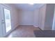 Cozy breakfast nook area featuring tile floors and access to backyard at 5504 Balsam Pl, Raleigh, NC 27603