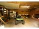 Spacious garage with ample storage space, shelving, and a convenient lawn mower at 5504 Balsam Pl, Raleigh, NC 27603