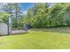 Expansive backyard with a well-maintained lawn, ideal for outdoor activities and relaxation at 5617 Groomsbridge Ct, Raleigh, NC 27612