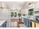 Eat-in kitchen provides a cozy space for casual dining with a pleasant view at 5617 Groomsbridge Ct, Raleigh, NC 27612