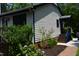 Beautiful landscaping featuring vibrant hydrangea bushes enhancing the home's curb appeal at 5617 Groomsbridge Ct, Raleigh, NC 27612