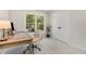 Well-lit office with neutral tones, providing an inviting and functional workspace at 5617 Groomsbridge Ct, Raleigh, NC 27612