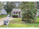 Quaint home with a lush green lawn and a classic mailbox at 5817 Seward Dr, Knightdale, NC 27545