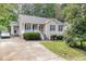 Charming home featuring a well-manicured front yard and a welcoming porch at 5817 Seward Dr, Knightdale, NC 27545