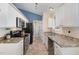 Well-appointed kitchen with stainless steel appliances, granite countertops, and ample cabinet storage at 5817 Seward Dr, Knightdale, NC 27545