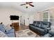 Open-concept living room features hardwood floors and natural light at 5817 Seward Dr, Knightdale, NC 27545