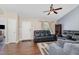 Inviting living room features hardwood floors and a ceiling fan at 5817 Seward Dr, Knightdale, NC 27545