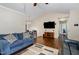 Bright living room with hardwood floors and ample seating at 5817 Seward Dr, Knightdale, NC 27545