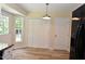 Bright dining area with views through the doors and windows at 5949 Sandy Run, Knightdale, NC 27545
