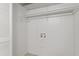 A closet with shelving and laundry hook-ups at 6411 Pondview Ln, Durham, NC 27712