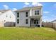 Large backyard with plenty of green space for activities and outdoor enjoyment at 6512 Bunker Hill Dr, Raleigh, NC 27610