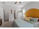 This bedroom features an accent wall and plush carpeting at 6512 Bunker Hill Dr, Raleigh, NC 27610